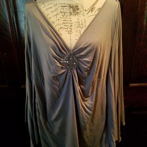 Gray sequined designed woman's top.